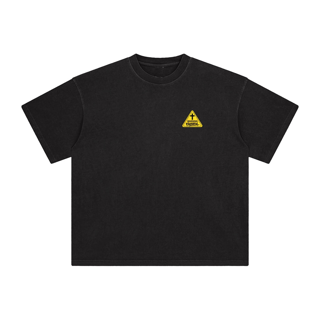 Foundation black oversized heavyweight cotton t-shirt with a yellow warning triangle graphic and "FAITHFUL" text on the chest.