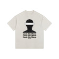 Foundation oversized vintage-washed t-shirt with a distressed blindfolded silhouette graphic and text.
