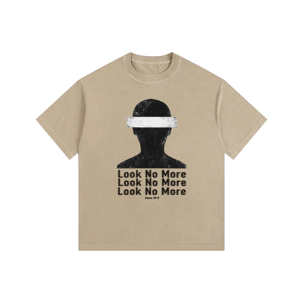 Foundation beige oversized t-shirt with a distressed graphic of a blindfolded silhouette and repeated text 'Look No More'.