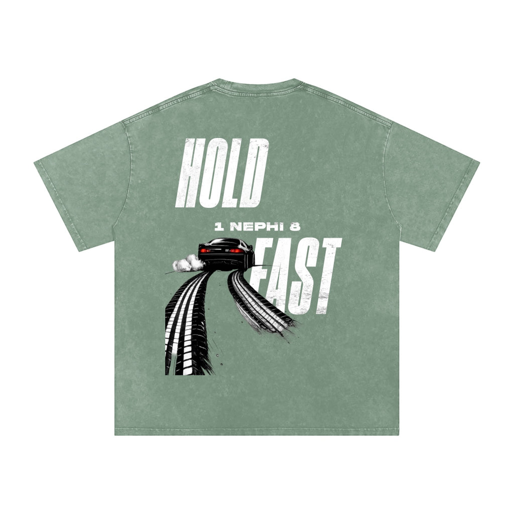 Foundation washed oversized t-shirt in sage green with "HOLD FAST" graphic and car drifting on back.