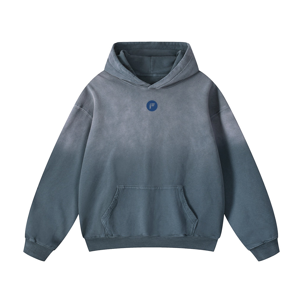 Foundation oversized grey washed cotton hoodie with blue logo on chest and front pocket.
