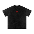 Foundation oversized vintage-washed black cotton t-shirt with red wax seal graphic on chest.