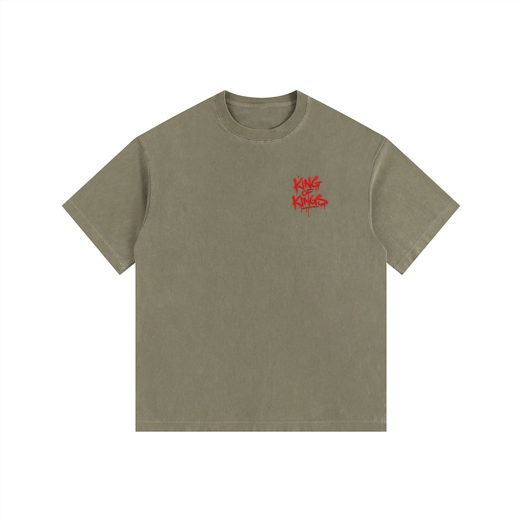 Foundation oversized washed olive green t-shirt with red "King of Kings" graphic on front.